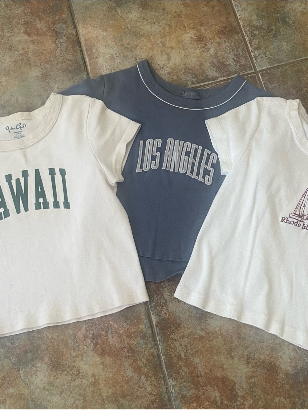 Brandy Melville Cream T‑Shirt/crop top set of 3.